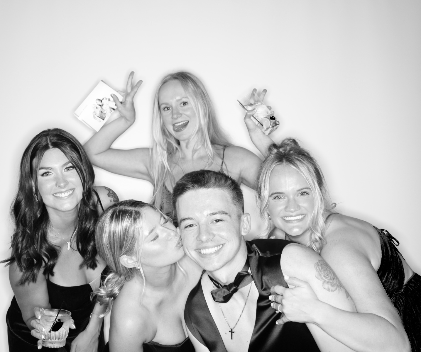 Photo booth rental at Chicago event - guests posing and celebrating with props
